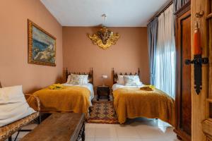 Katil atau katil-katil dalam bilik di 16 San Sebastian