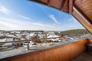 a view of a town from the balcony of a house at Haus Kandelblick in Furtwangen