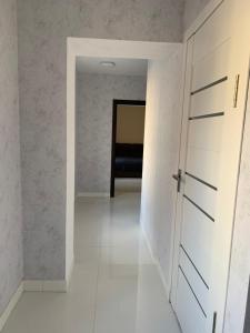 Ένα ή περισσότερα κρεβάτια σε δωμάτιο στο Апартаменти