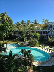 Bazén v ubytování Kokosnuss Garden Resort nebo v jeho okolí