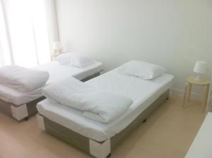 Postel nebo postele na pokoji v ubytování A-Port