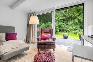 Posezení v ubytování Ferienhaus Ostsee Hideaway Maasholm Bad