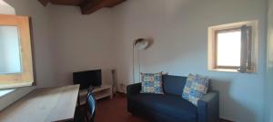 TV a/nebo společenská místnost v ubytování Lumira Vista - Borgo