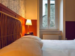 Ένα ή περισσότερα κρεβάτια σε δωμάτιο στο Ciel Etoilé Cocon Chic en hyper-centre +25 φωτογραφίες