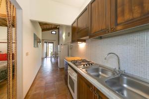 Η κουζίνα ή μικρή κουζίνα στο il Nazareno - Il Coppaio