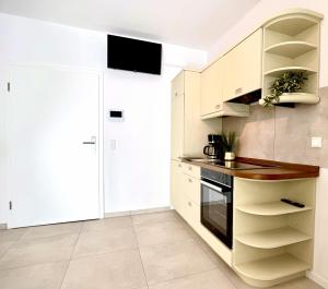 Kuchyň nebo kuchyňský kout v ubytování FlexHome Stadtnatur Ferienwohnung + 7 fotografií