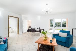 Χώρος καθιστικού στο Appartamento La vela rossa