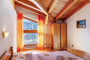 Giường trong phòng chung tại Kellerjoch