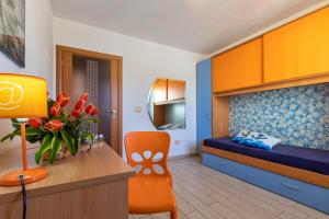 Ένα ή περισσότερα κρεβάτια σε δωμάτιο στο Casa vacanze Sardegna il Corbezzolo