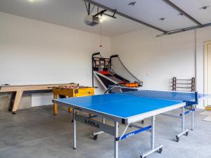 a ping pong room with a ping pong table at 36 Huntsman in Florissant