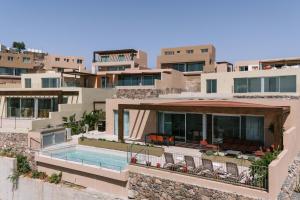 an image of a house with a swimming pool at Salobre Homes in Salobre
