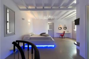 En eller flere senge i et værelse på Echinousa Kimolos Maisonette no3