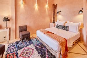 Postel nebo postele na pokoji v ubytování Riad Caravane