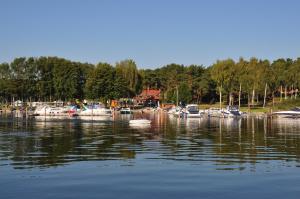a group of boats are docked in the water at Ferienwohnung Maribell in Jabel