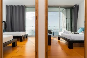 Postel nebo postele na pokoji v ubytování Funchal Harbour Home + 37 fotografií