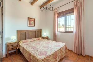 Postel nebo postele na pokoji v ubytování Villa Conilsur + 31 fotografií