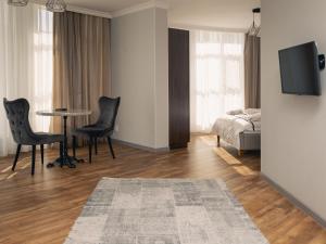 Postel nebo postele na pokoji v ubytování 71 East Apart Hotel