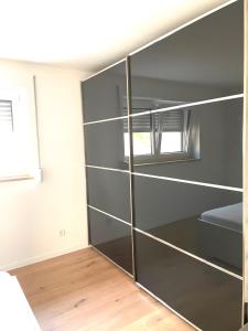 Postel nebo postele na pokoji v ubytování Apartment la rosa