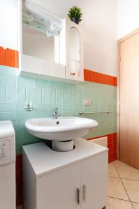 Een badkamer bij Appartamenti Caletta sul mare