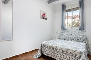 a bedroom with a bed and a window at Casa Sheila in Campano +17 photos