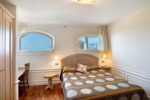 Postel nebo postele na pokoji v ubytování Villa Caroleo + 37 fotografií