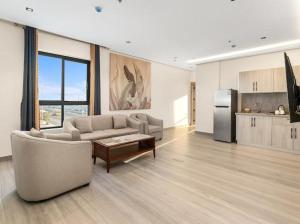 لباسا لشقق المخدومةにあるキッチンまたは簡易キッチン