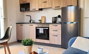Kuchyň nebo kuchyňský kout v ubytování Apartment Zefiro