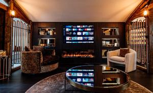 TV a/nebo společenská místnost v ubytování The Penthouse