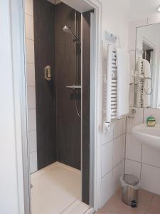 Koupelna v ubytování Gästehaus Langhammer + 34 fotografií