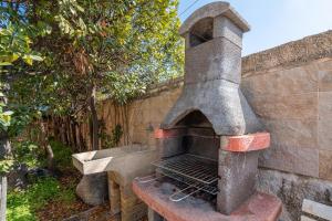 Gril dostupný pro hosty v vily