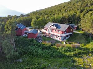 an aerial view of a house on a hill at Lillian's gjestehus, Skibotn in Skibotn