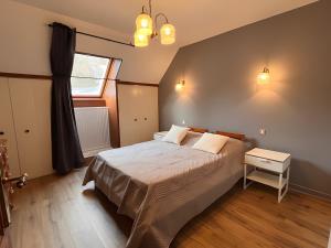 Postel nebo postele na pokoji v ubytování Villa Nina