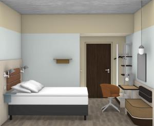 a bedroom with a bed and a desk and a chair at Comfort Hotel Grenlandsporten in Lii