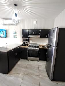 Kuchyň nebo kuchyňský kout v ubytování LITTLE SHELL