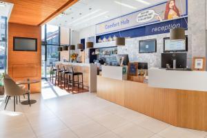 TV a/nebo společenská místnost v ubytování Comfort Hotel Olomouc Centre