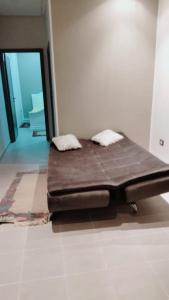 Postel nebo postele na pokoji v ubytování palmera appart