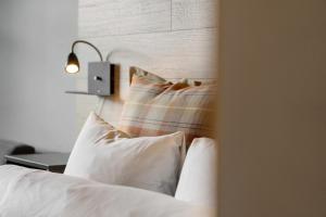 Postel nebo postele na pokoji v ubytování Trysil Hotel