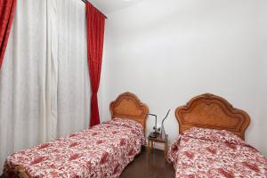 Postel nebo postele na pokoji v ubytování Casa Clásica Santa Cruz de la Palma