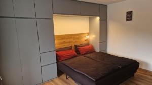 Ένα ή περισσότερα κρεβάτια σε δωμάτιο στο Apartment Schwarzwaldtraum