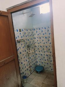 Koupelna v ubytování John Tharu Home Stay