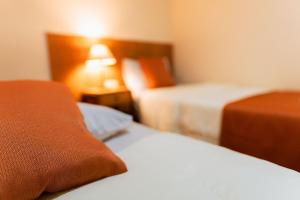 Postel nebo postele na pokoji v ubytování Pousada Viver Búzios