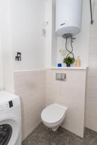 Koupelna v ubytování Obinitsa Apartment + 9 fotografií