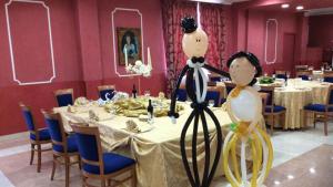 A restaurant or other place to eat at Albergo Roma