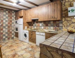 Kuchyň nebo kuchyňský kout v ubytování Castillo Eugenio