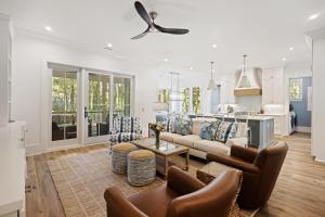 a living room with a couch and a table at BW3131: 3131 Baywood Drive in Seabrook Island