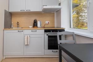Eldhús eða eldhúskrókur á Obinitsa Apartment