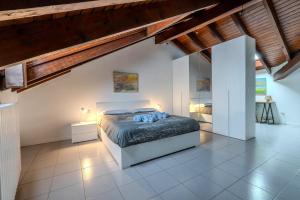 Ένα ή περισσότερα κρεβάτια σε δωμάτιο στο Cozy Apartment Seregno