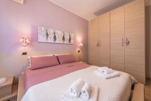 Postel nebo postele na pokoji v ubytování Villa Maria Beatrice