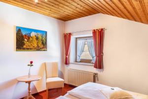Postel nebo postele na pokoji v ubytování Alpenblick Tilly Fewo Walchensee 5