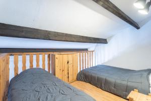 Ένα ή περισσότερα κρεβάτια σε δωμάτιο στο Gîte Le 874 +17 φωτογραφίες